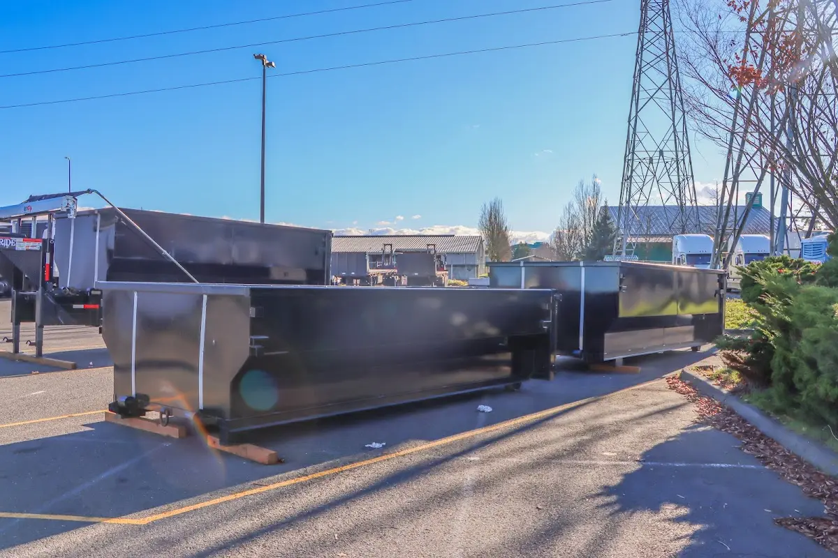 Roll-off dumpster ready for waste disposal at job site for Construction Dumpster Rental in Avon Lake